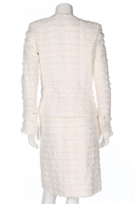 Lot 133 - A Chanel white cotton-tweed suit, 2005,...