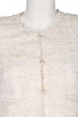 Lot 133 - A Chanel white cotton-tweed suit, 2005,...