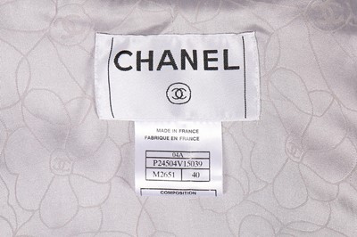 Lot 134 - A Chanel pastel-coloured tweed jacket, 2004,...