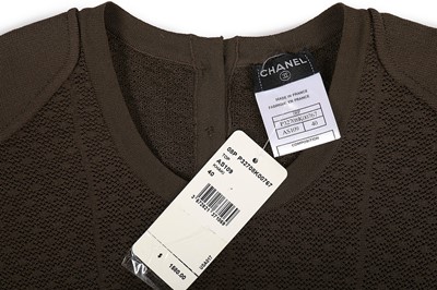 Lot 136 - Two Chanel knitted jersey ensembles, 2008,...