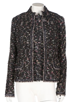 Lot 196 - A Chanel tweed jacket and matching bodice,...