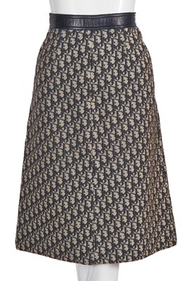 Lot 222 - A Christian Dior 'Trotter' logo-woven cotton A-line skirt, 1960s
