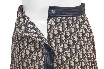 Lot 222 - A Christian Dior 'Trotter' logo-woven cotton A-line skirt, 1960s