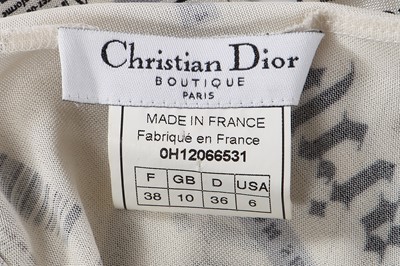 Lot 153 - A Christian Dior by John Galliano newspaper print dress, 'Fly Girl' collection, Autumn-Winter 2000-01