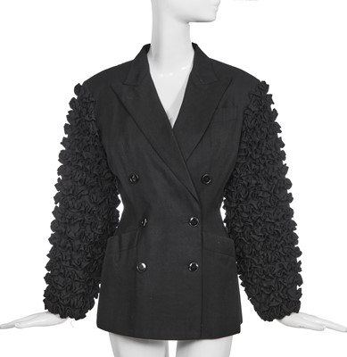 Lot 131 - A Jean Paul Gaultier black wool and cotton jacket, circa 1990