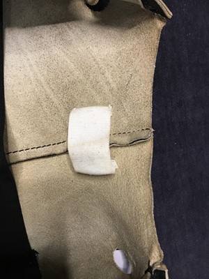 Lot 232 - A Maison Martin Margiela 'Flat' leather jacket and metal hook, Spring-Summer 1998