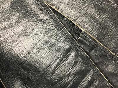 Lot 232 - A Maison Martin Margiela 'Flat' leather jacket and metal hook, Spring-Summer 1998