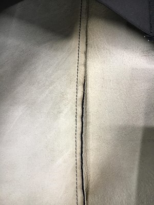 Lot 232 - A Maison Martin Margiela 'Flat' leather jacket and metal hook, Spring-Summer 1998