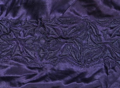 Lot 414 - An important and early Gabrielle Chanel haute couture embroidered midnight blue satin coat, 1917