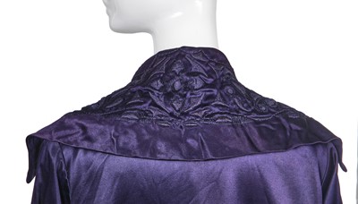 Lot 414 - An important and early Gabrielle Chanel haute couture embroidered midnight blue satin coat, 1917