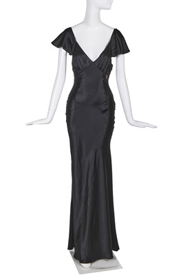 Lot 179 - A John Galliano black satin evening dress, circa 2009