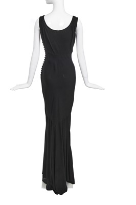 Lot 180 - A John Galliano beaded black crêpe georgette evening dress, 'The Family That Eats Together Stays Together' collection, Autumn-Winter 2007-08