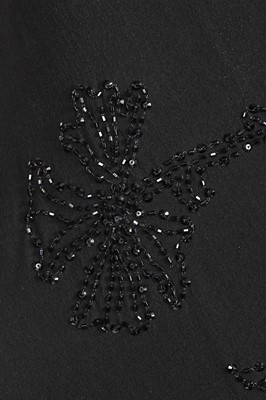 Lot 180 - A John Galliano beaded black crêpe georgette evening dress, 'The Family That Eats Together Stays Together' collection, Autumn-Winter 2007-08