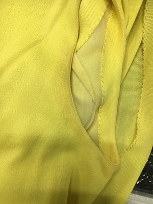 Lot 353 - A Madame Grès haute couture primrose jersey evening gown, circa 1963