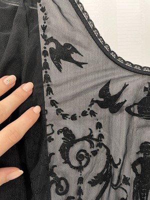 Lot 111 - A Vivienne Westwood flocked black tulle 'Boulle' body, 1992