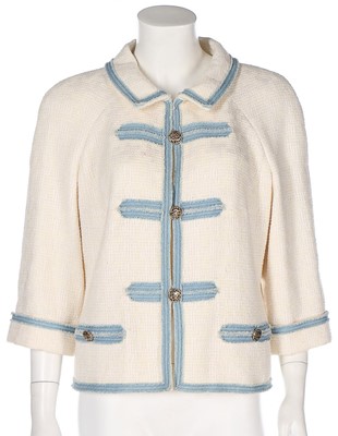 Lot 233 - Two Chanel white cotton-blend jackets, 2000s,...
