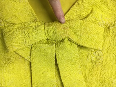 Lot 343 - A Christian Dior New York yellow matelassé silk evening gown, circa 1965