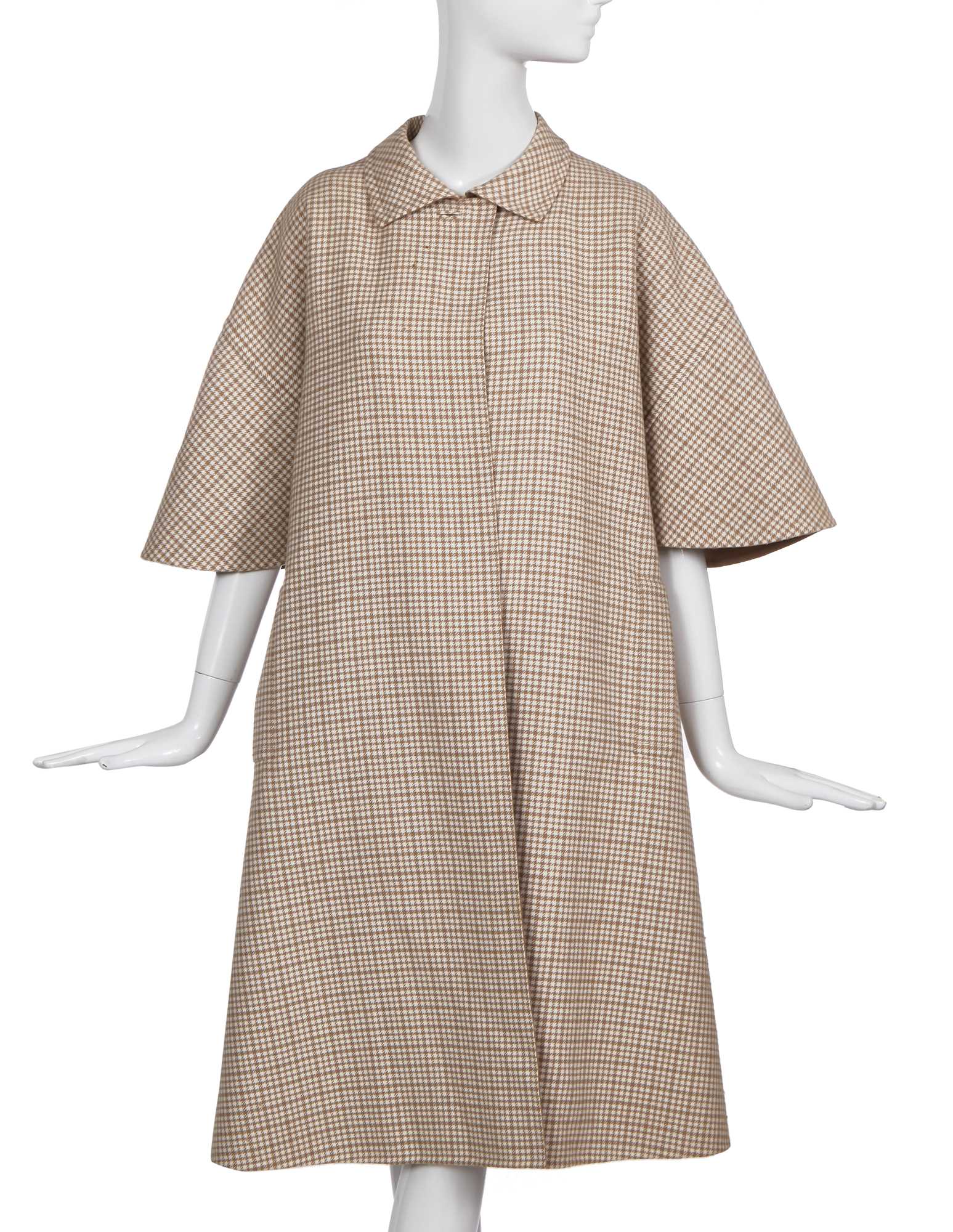 Lot 354 - A Madame Grès haute couture beige and white checked wool coat, 1960s