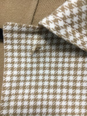 Lot 354 - A Madame Grès haute couture beige and white checked wool coat, 1960s