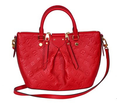 Lot 59 - A Louis Vuitton red leather Mazarine PM handbag, 2015