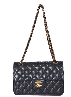 Lot 48 - A Chanel quilted black lambskin leather classic double flap bag, 2010-2011