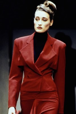 Lot 299 - A John Galliano burgundy wool crêpe suit, 'Maori' collection, Autumn-Winter 1999-2000