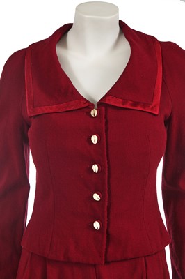 Lot 299 - A John Galliano burgundy wool crêpe suit, 'Maori' collection, Autumn-Winter 1999-2000