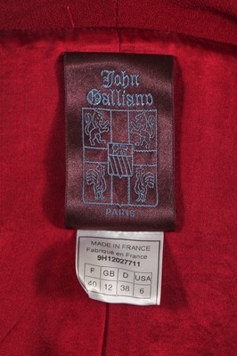 Lot 299 - A John Galliano burgundy wool crêpe suit, 'Maori' collection, Autumn-Winter 1999-2000