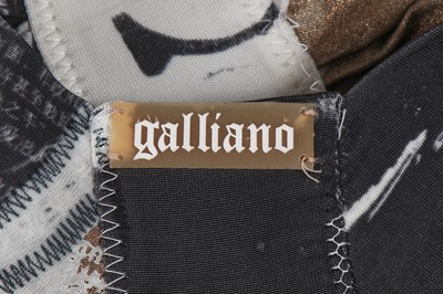 Lot 269 - A John Galliano newspaper print stretch jersey dress, 2000s