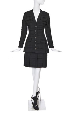 Lot 50 - A Chanel haute couture by Karl Lagerfeld black grosgrain ribbon suit and shoes, Spring-Summer 1991