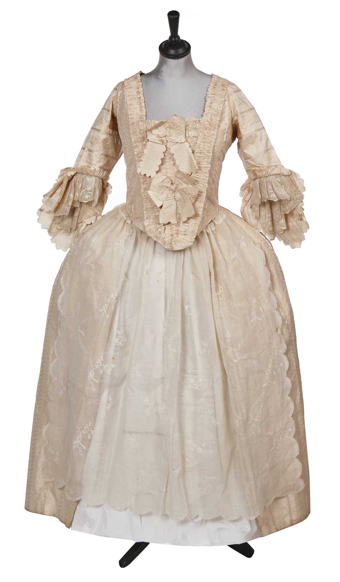 Lot 424 - An ivory striped silk robe a l'Anglaise, 1773