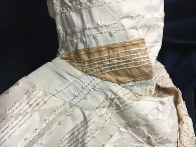 Lot 424 - An ivory striped silk robe a l'Anglaise, 1773