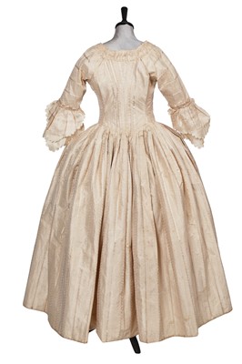 Lot 424 - An ivory striped silk robe a l'Anglaise, 1773