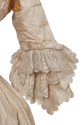 Lot 424 - An ivory striped silk robe a l'Anglaise, 1773