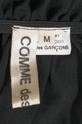 Lot 279 - A Comme des Garçons black polyester dress, 2008