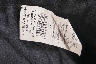 Lot 230 - A Dolce and Gabbana black viscose dress, probably 2010s