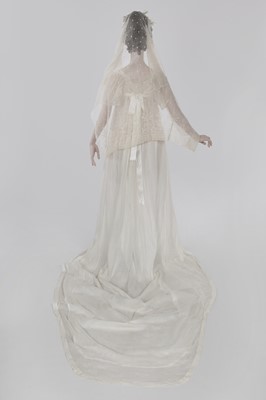 Lot 43 - A fine Indian muslin bridal gown with long train, English, 1805