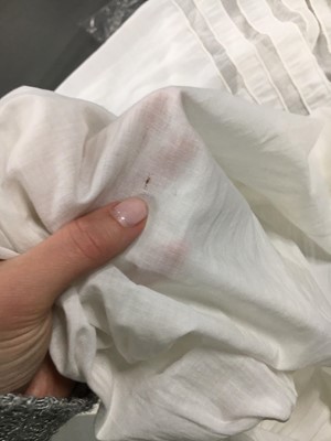 Lot 110 - A white percale cotton gown, English, circa 1815