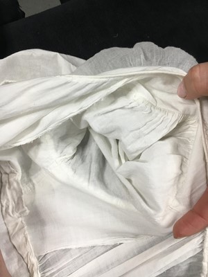 Lot 110 - A white percale cotton gown, English, circa 1815
