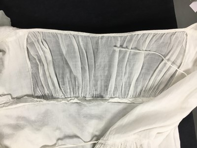 Lot 110 - A white percale cotton gown, English, circa 1815