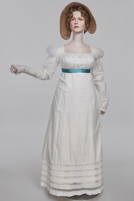 Lot 110 - A white percale cotton gown, English, circa 1815