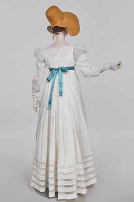 Lot 110 - A white percale cotton gown, English, circa 1815
