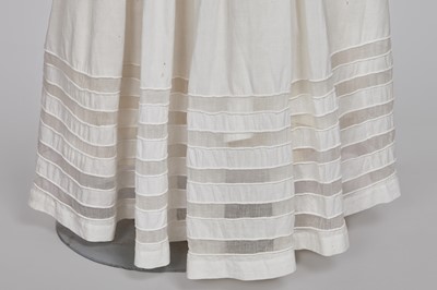 Lot 110 - A white percale cotton gown, English, circa 1815