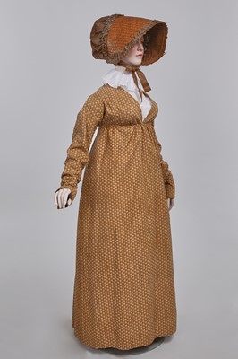 Lot 106 - A Provençal printed cotton day dress, French, circa 1815