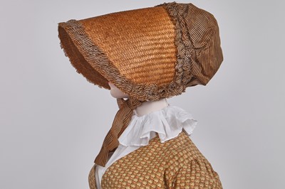 Lot 106 - A Provençal printed cotton day dress, French, circa 1815