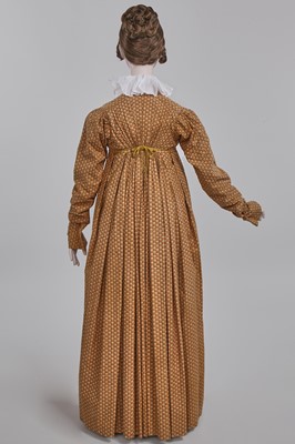 Lot 106 - A Provençal printed cotton day dress, French, circa 1815