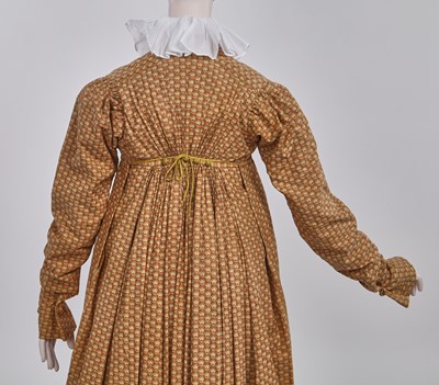 Lot 106 - A Provençal printed cotton day dress, French, circa 1815