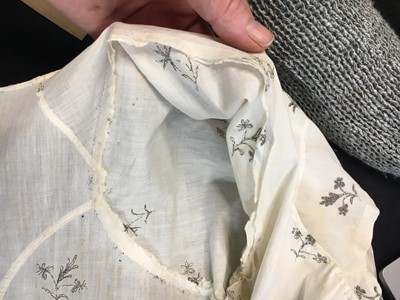 Lot 33 - A white cotton gown with silver Indian embroidery with pointed train, German, 1803-1805