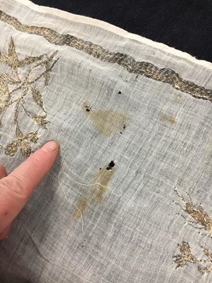 Lot 33 - A white cotton gown with silver Indian embroidery with pointed train, German, 1803-1805