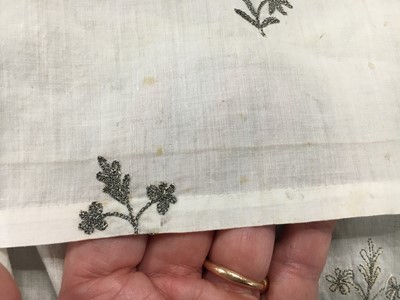 Lot 33 - A white cotton gown with silver Indian embroidery with pointed train, German, 1803-1805